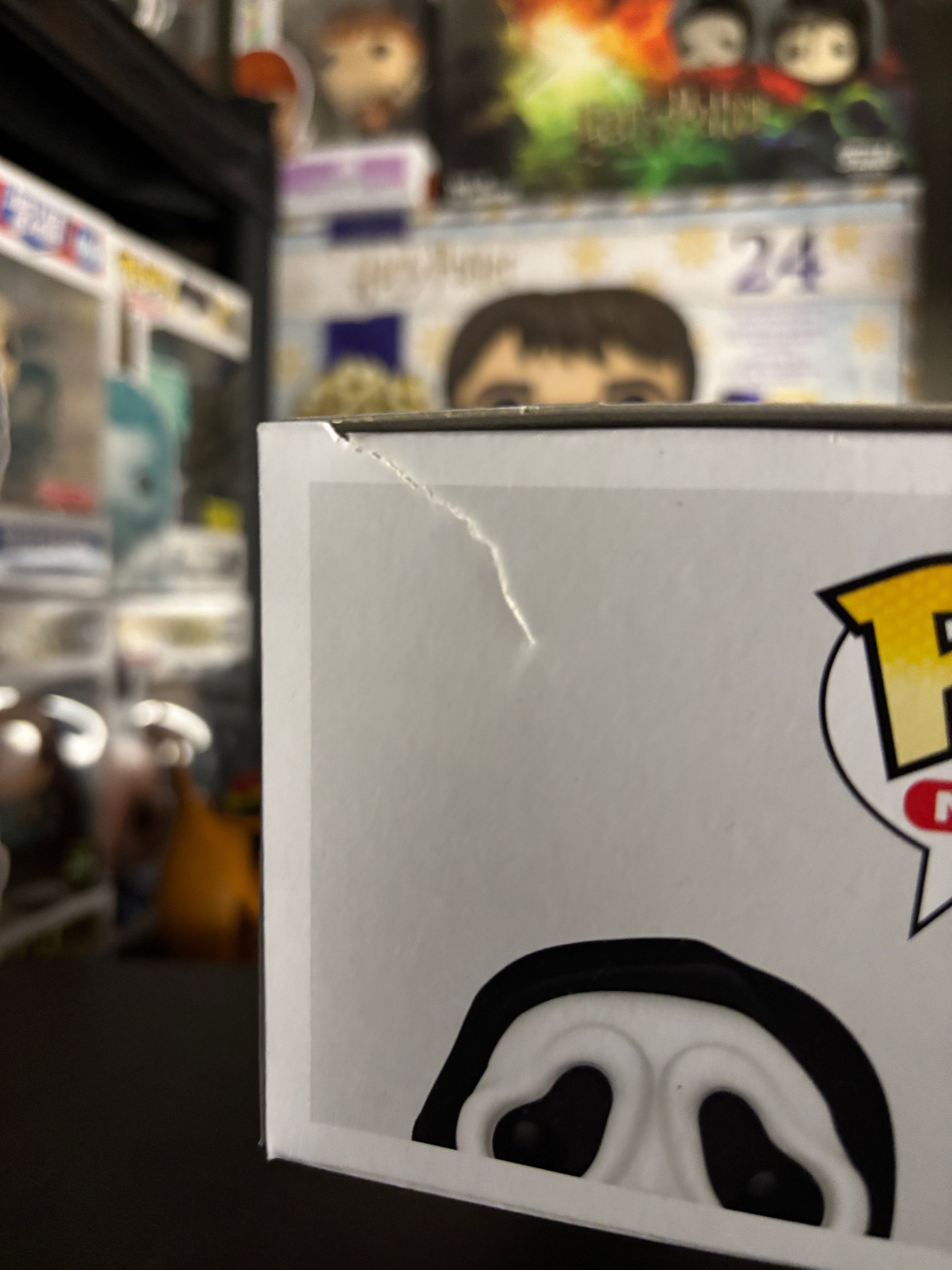 Funko Pop Ghost Face Glows in the Dark (Daño en Caja)